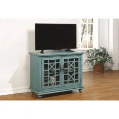 Elegant Teal Composite TV Stand Fits TVs Up to 42 in. with Removable Shelves by Martin Svensson Home -EVERGLADE HOME Shop teal martin svensson home tv stands 91031 31 1000