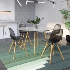 Dover Black Modern Eiffel Base Plastic Dining Chair With Wood Legs Transparent (Set of 4) by Leisuremod -EVERGLADE HOME Shop transparent black leisuremod dining chairs ep19tbl4 31 1000